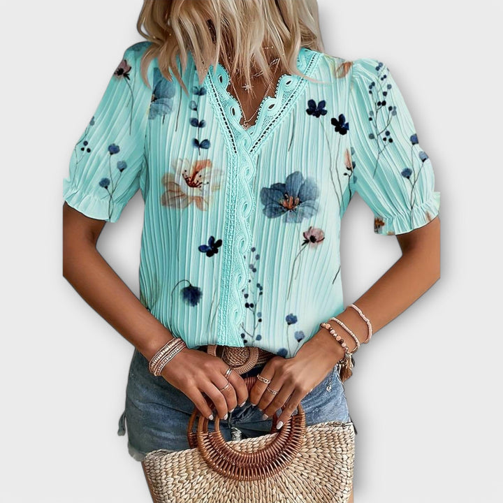 Emily - Modrna bluza s oštrim izrezom