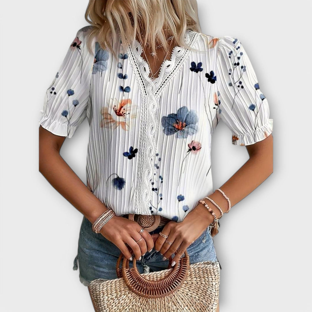 Emily - Modrna bluza s oštrim izrezom