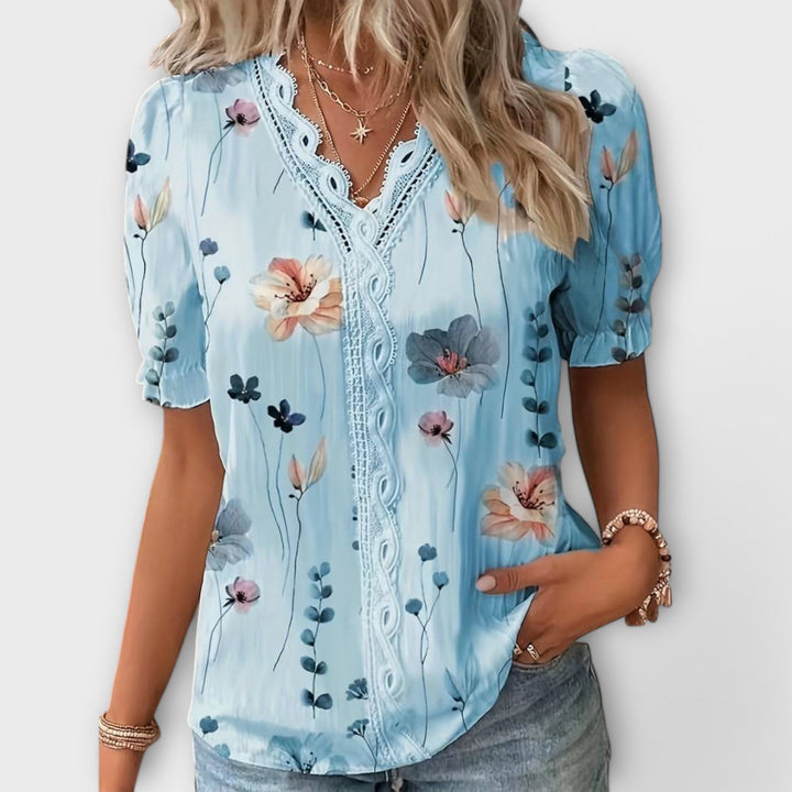 Emily - Modrna bluza s oštrim izrezom
