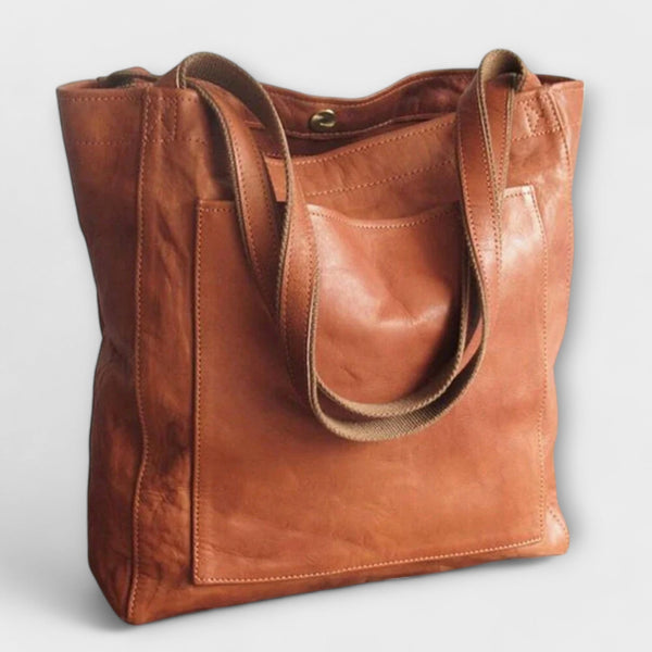 Lora. - Elegantna i praktična torba preko ramena